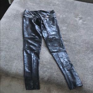 Black textured zipper leggings